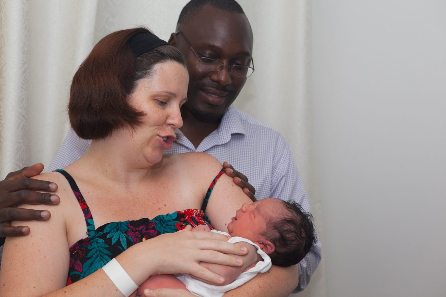 A couple with their newborn